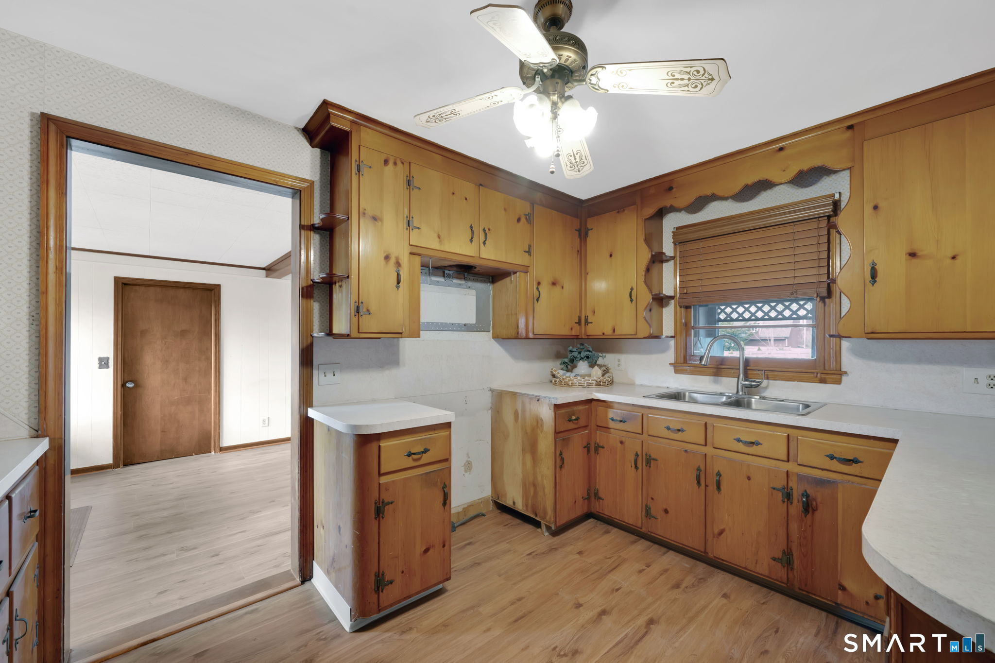 10 Helena Lane Windsor Locks, CT 06096 - Photo 8 of 36 a kitchen with stainless steel appliances granite countertop a sink a stove and cabinets