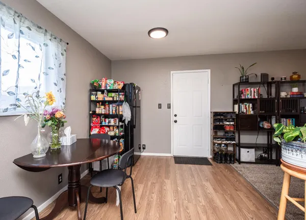 a room with furniture and a book shelf