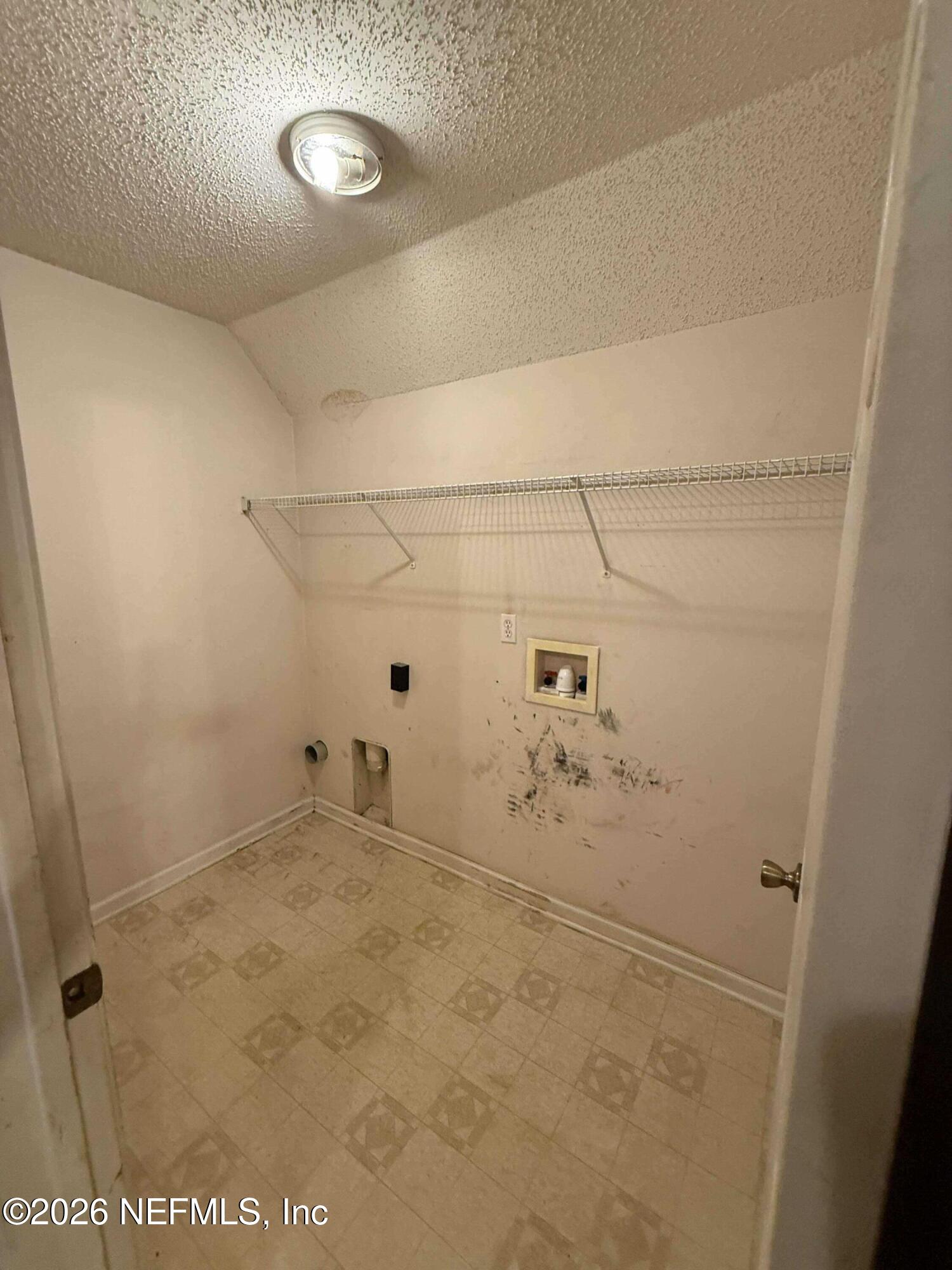 8319 Springtree Road Jacksonville, FL 32210 - Photo 20 of 22 laundry