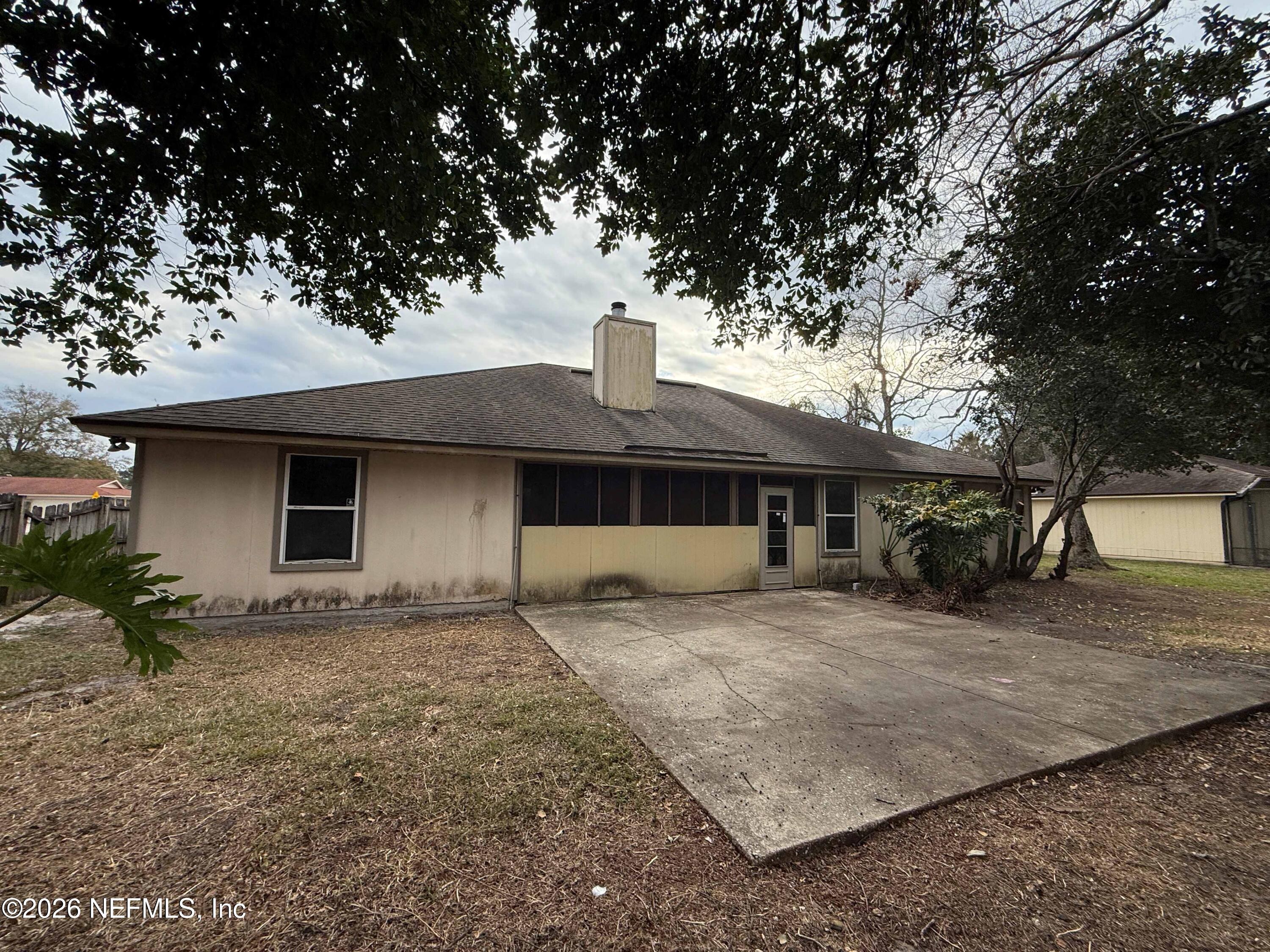 8319 Springtree Road Jacksonville, FL 32210 - Photo 2 of 22 rear full