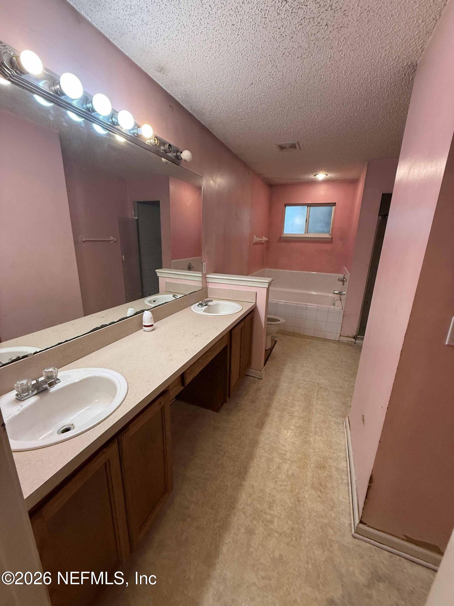 8319 Springtree Road Jacksonville, FL 32210 - Photo 10 of 22 bath master