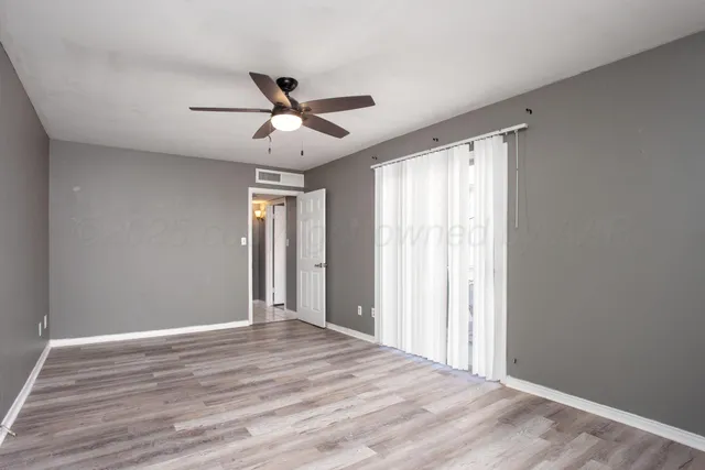 a wooden door in front of a house