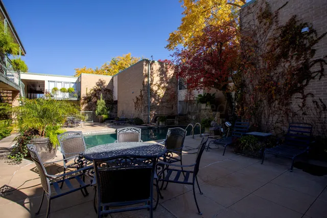 a view of a building with sitting area