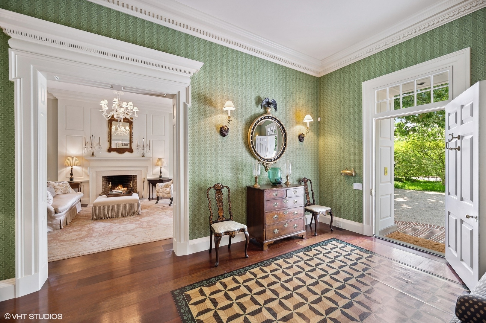 25 Indian Hill Road Winnetka, IL 60093 - Photo 11 of 84 a living room with furniture a fireplace and a table
