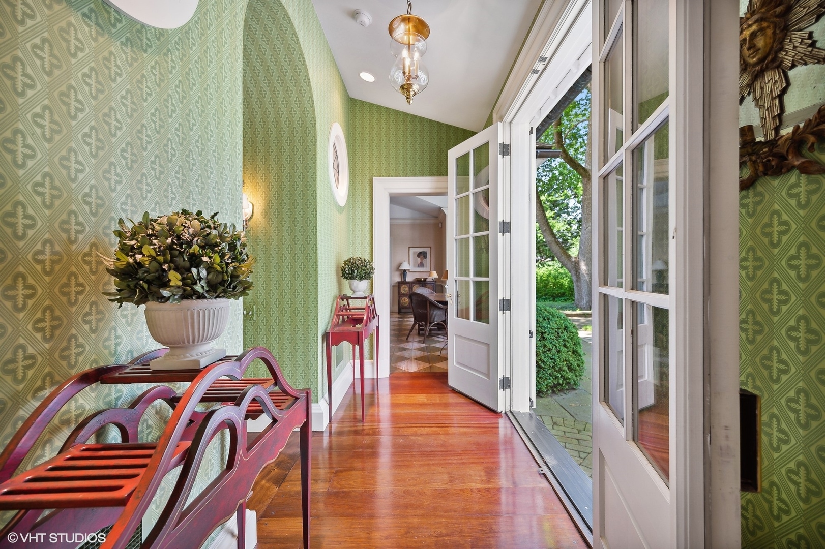 25 Indian Hill Road Winnetka, IL 60093 - Photo 14 of 84 a front view of a house with outdoor seating