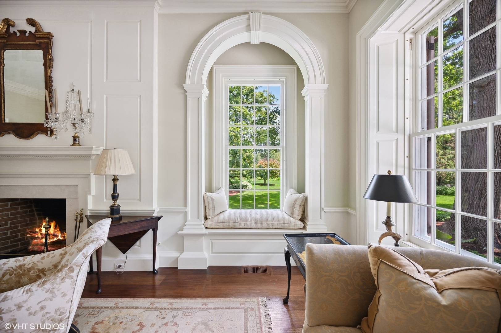 25 Indian Hill Road Winnetka, IL 60093 - Photo 18 of 84 a living room with furniture a window and a fireplace