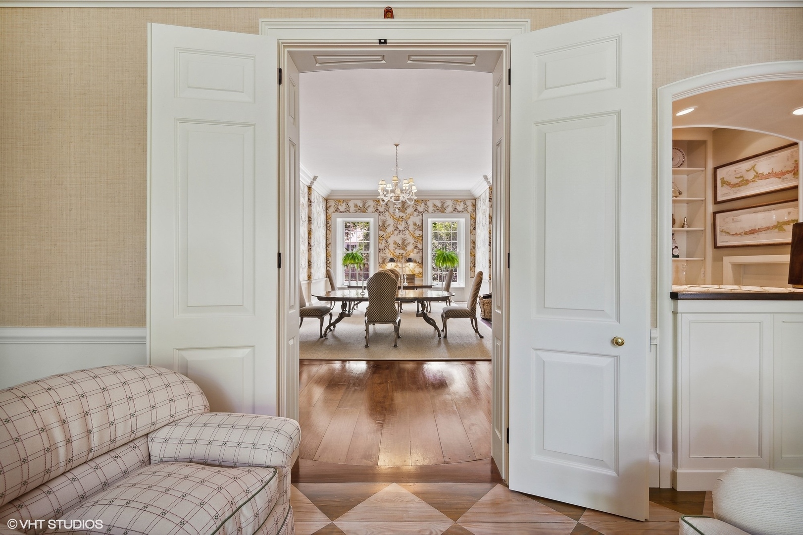25 Indian Hill Road Winnetka, IL 60093 - Photo 28 of 84 a living room with furniture and a chandelier