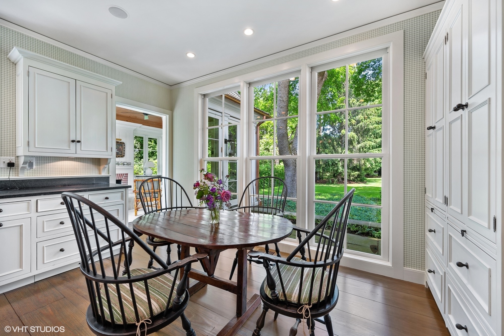 25 Indian Hill Road Winnetka, IL 60093 - Photo 36 of 84 a view of a dining room with furniture window and outside view
