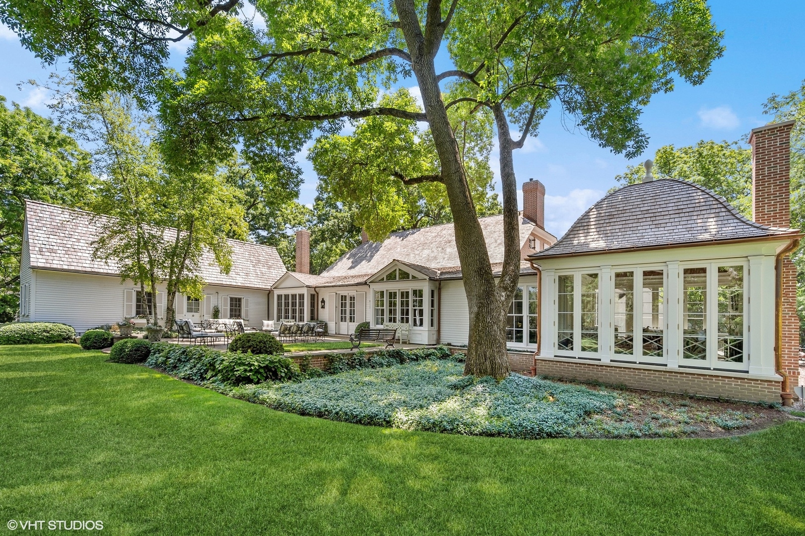 25 Indian Hill Road Winnetka, IL 60093 - Photo 42 of 84 front view of a house with a yard