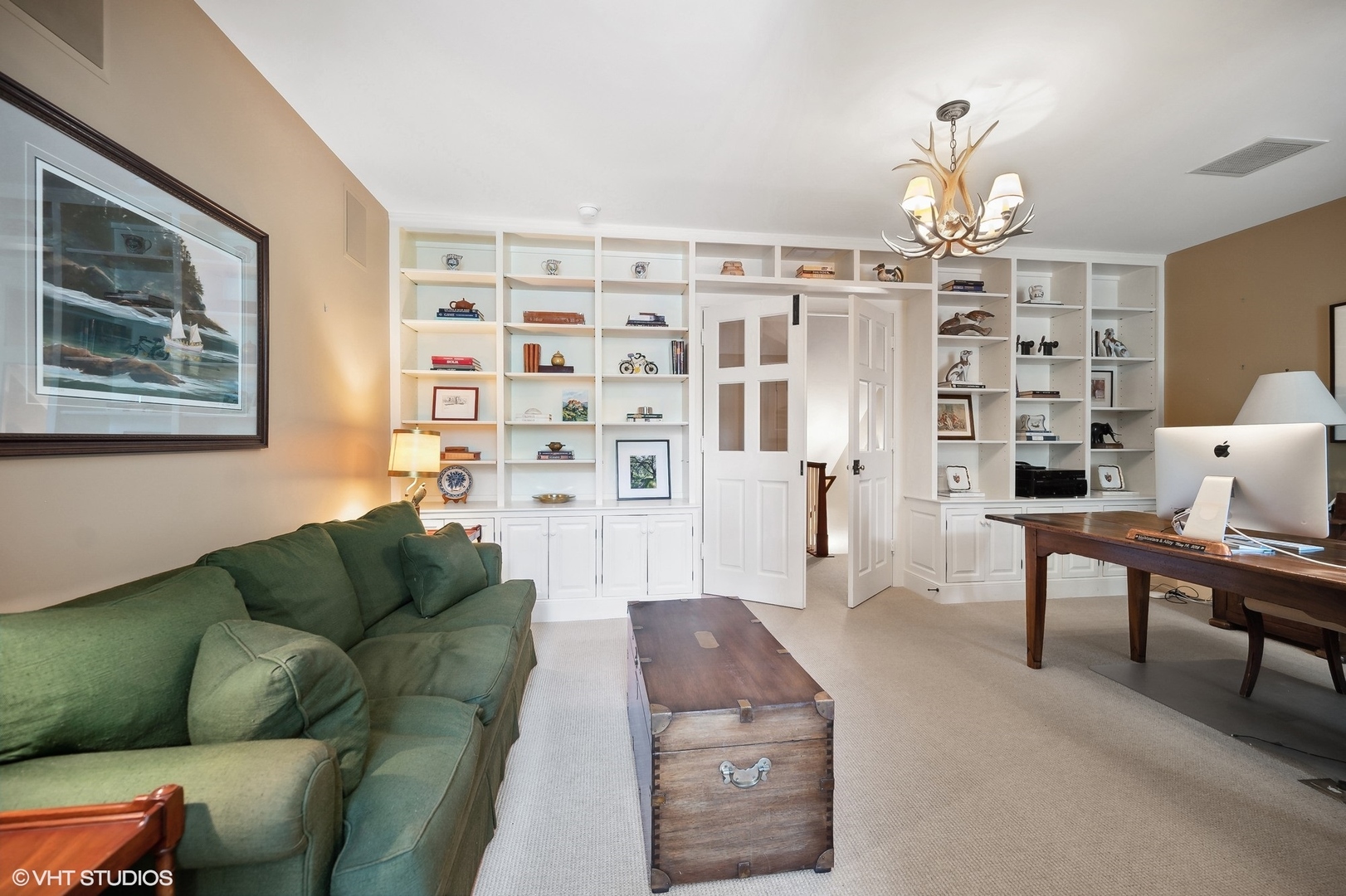 25 Indian Hill Road Winnetka, IL 60093 - Photo 69 of 84 a living room with furniture a dining table and a chandelier