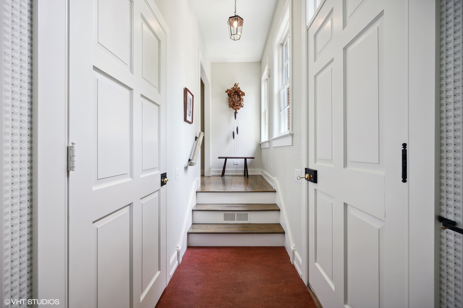 25 Indian Hill Road Winnetka, IL 60093 - Photo 77 of 84 a view of a hallway with wooden floor and stairs