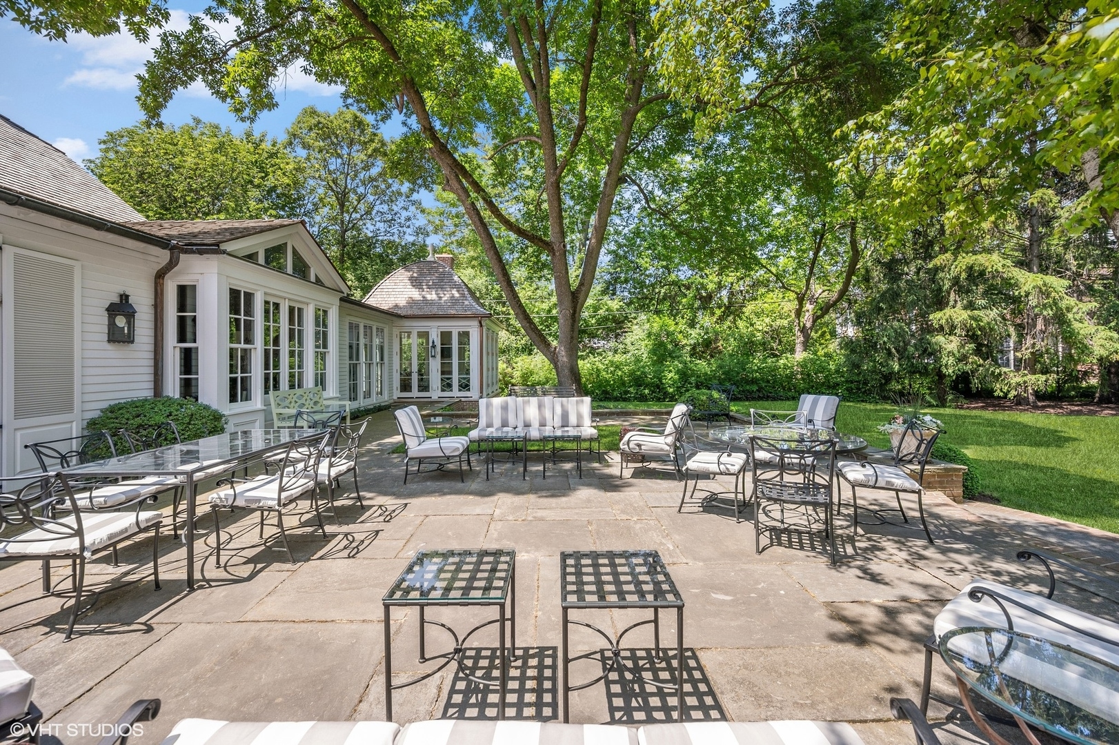 25 Indian Hill Road Winnetka, IL 60093 - Photo 79 of 84 a view of backyard with patio outdoor seating and green space