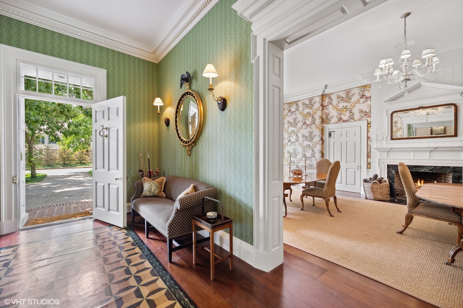 25 Indian Hill Road Winnetka, IL 60093 - Photo 9 of 84 a living room with furniture a chandelier and a large window