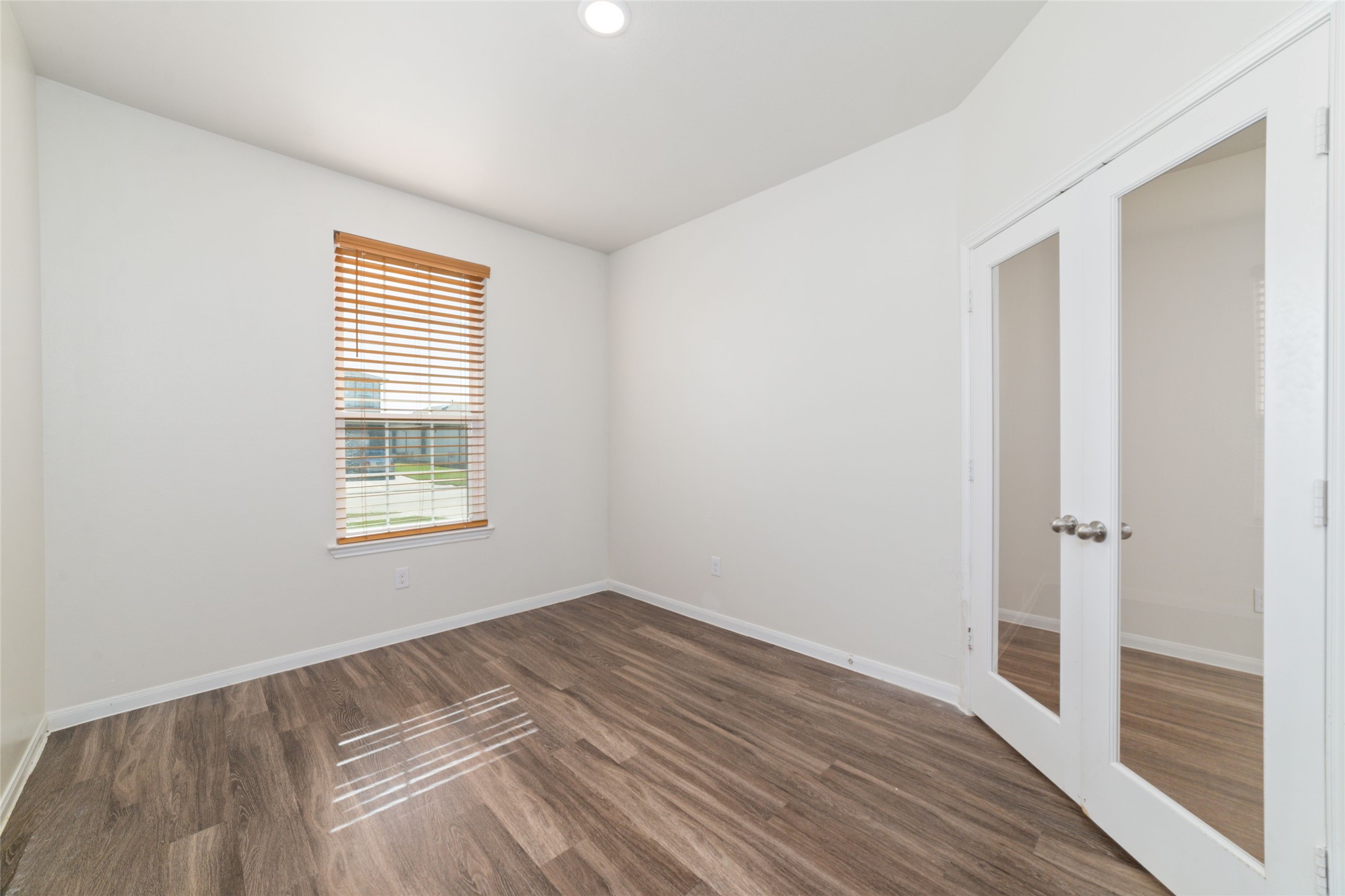7227 Hobby Wind Ridge Drive Houston, TX 77075 - Photo 12 of 25 a view of a room that has a window in it