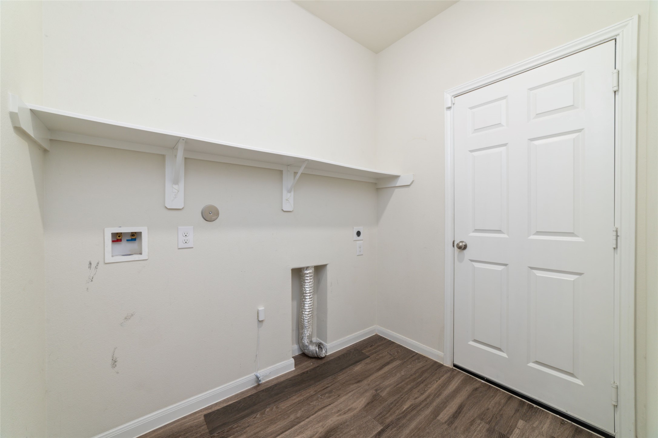 7227 Hobby Wind Ridge Drive Houston, TX 77075 - Photo 18 of 25 an empty room with wooden floor