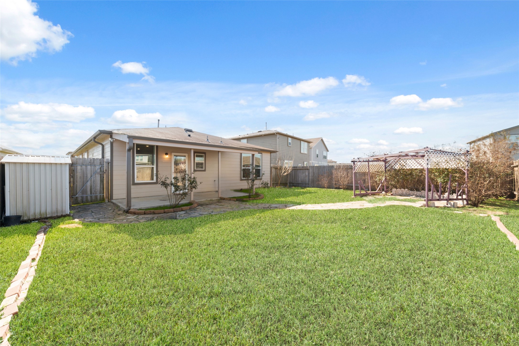 7227 Hobby Wind Ridge Drive Houston, TX 77075 - Photo 6 of 25 a view of an house with backyard and swimming pool
