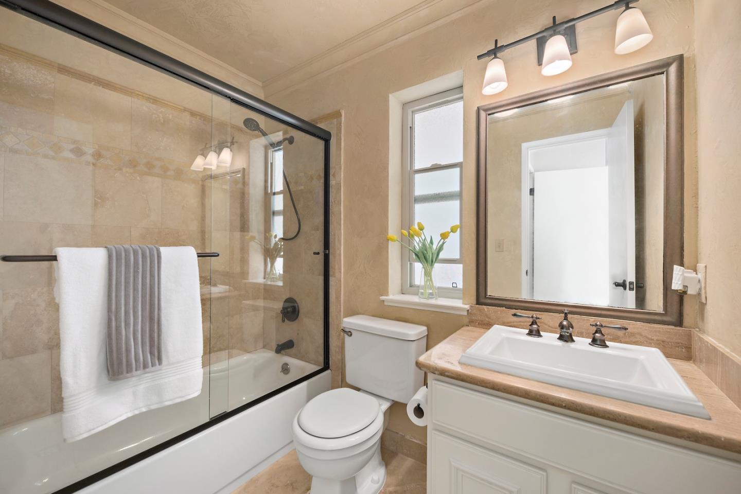 1213 Capri Drive Campbell, CA 95008 - Photo 14 of 27 a bathroom with a sink a toilet and a large mirror