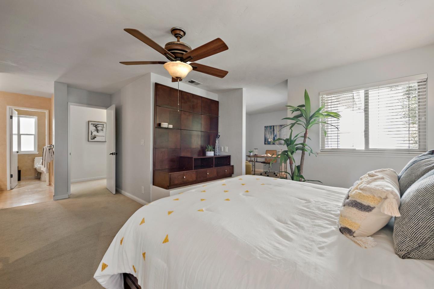 1213 Capri Drive Campbell, CA 95008 - Photo 17 of 27 a bedroom with a large bed and a chandelier