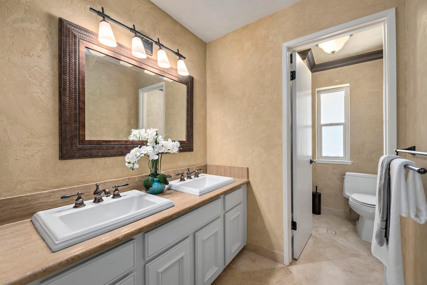 1213 Capri Drive Campbell, CA 95008 - Photo 19 of 27 a bathroom with a sink and a mirror