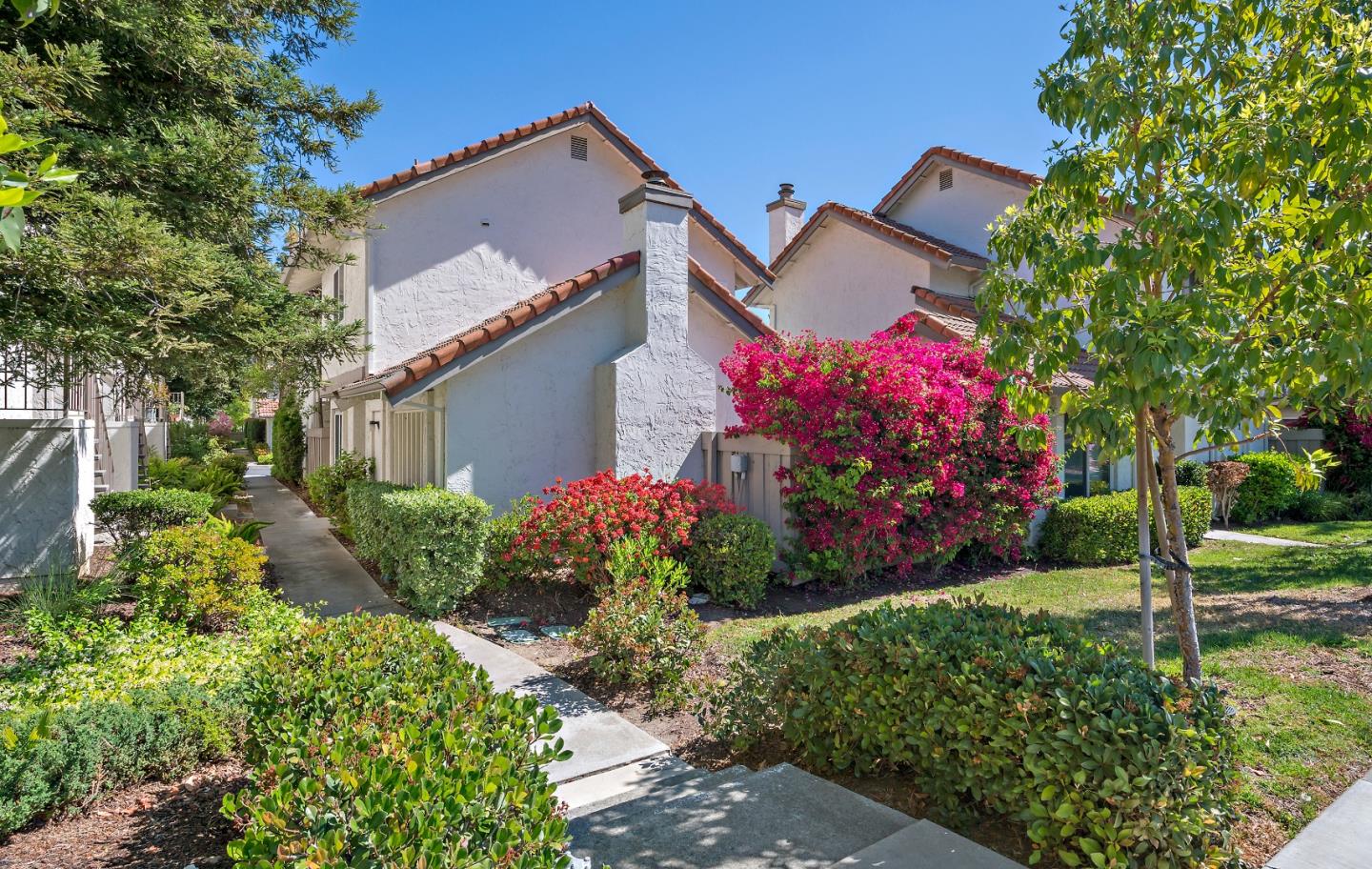 1213 Capri Drive Campbell, CA 95008 - Photo 23 of 27 a front view of a house with a yard and fountain