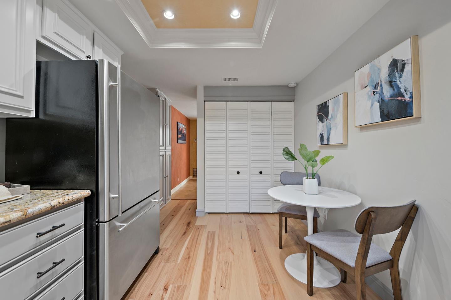 1213 Capri Drive Campbell, CA 95008 - Photo 8 of 27 a kitchen with granite countertop stainless steel appliances and wooden floor