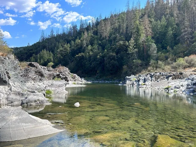 a view of a yard with mountain view