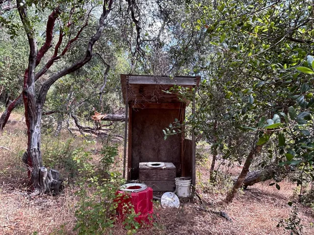 a view of a car parked in front of a house