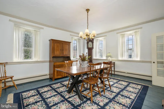 a bathroom with a sink a mirror and a vanity