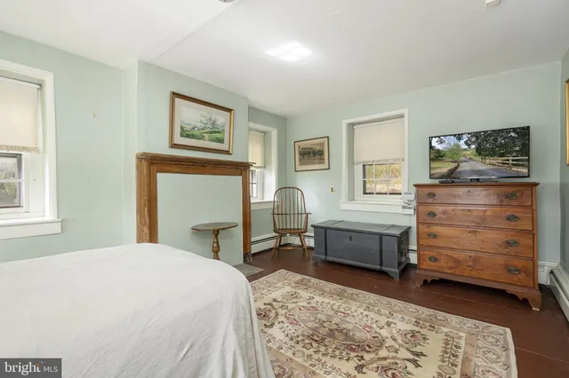 a view of a tree in front of a house
