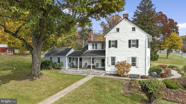 a view of a floor to ceiling window and an ocean view