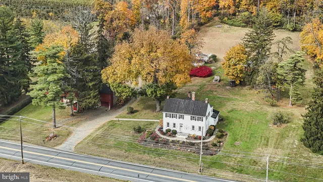 a view of a dining room with furniture and window