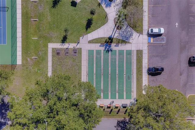 a room with lots of chairs and mirrors
