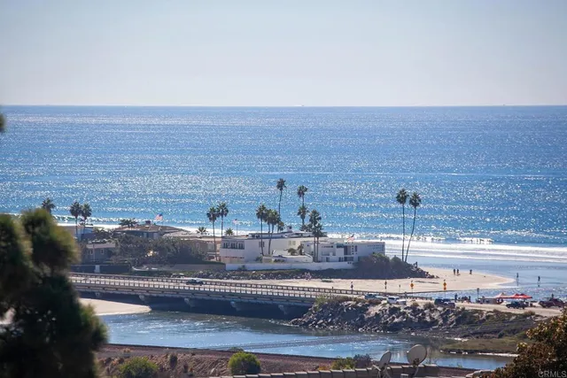 a living room with couch and a window