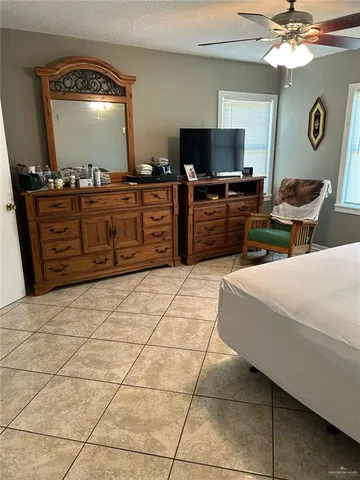 a kitchen with a sink appliances and cabinets