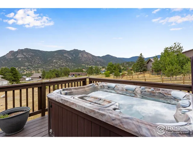 a view of swimming pool from a balcony