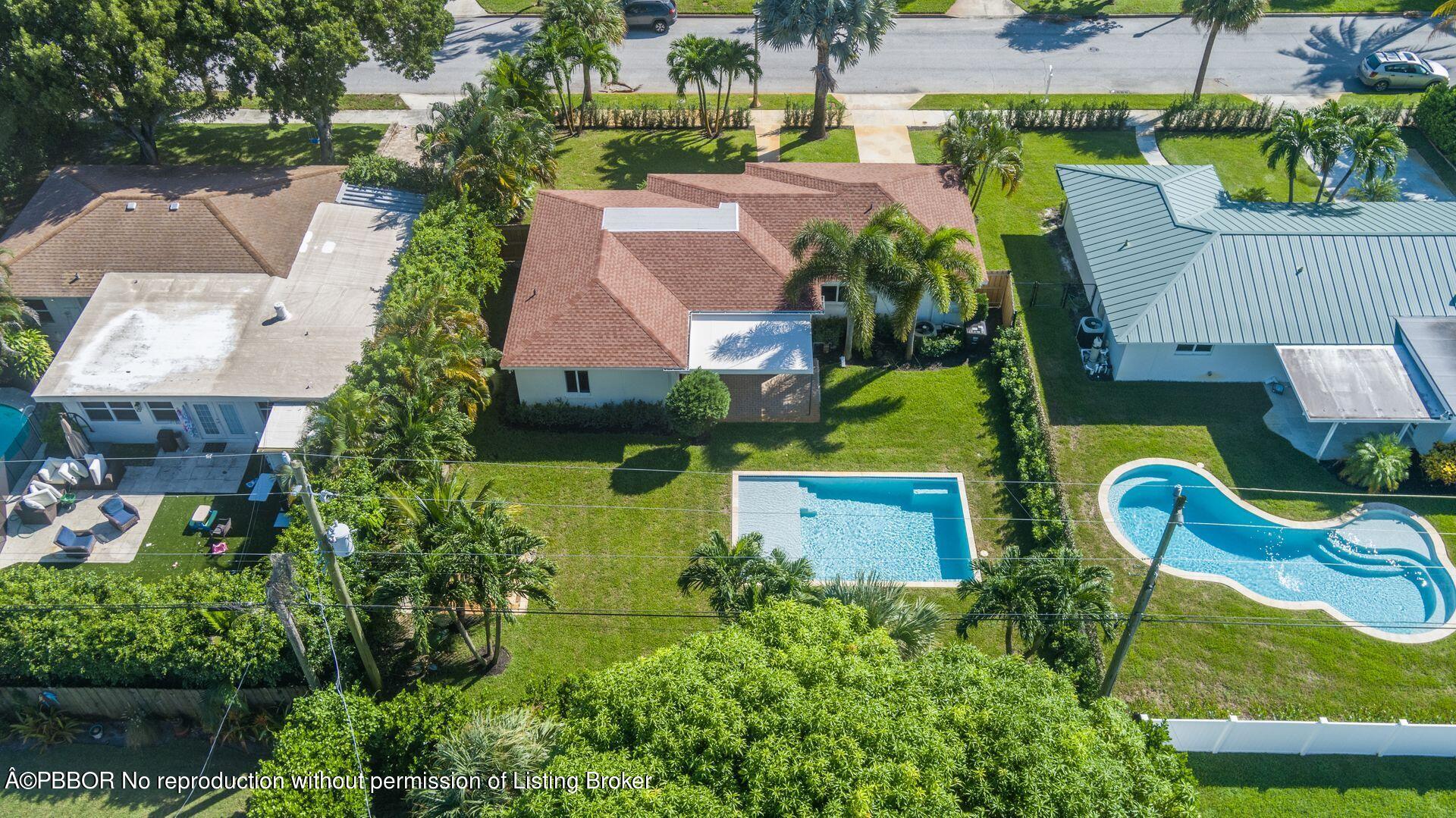 361 Franklin Road West Palm Beach, FL 33405 - Photo 23 of 32 an aerial view of house with swimming pool outdoor seating and yard