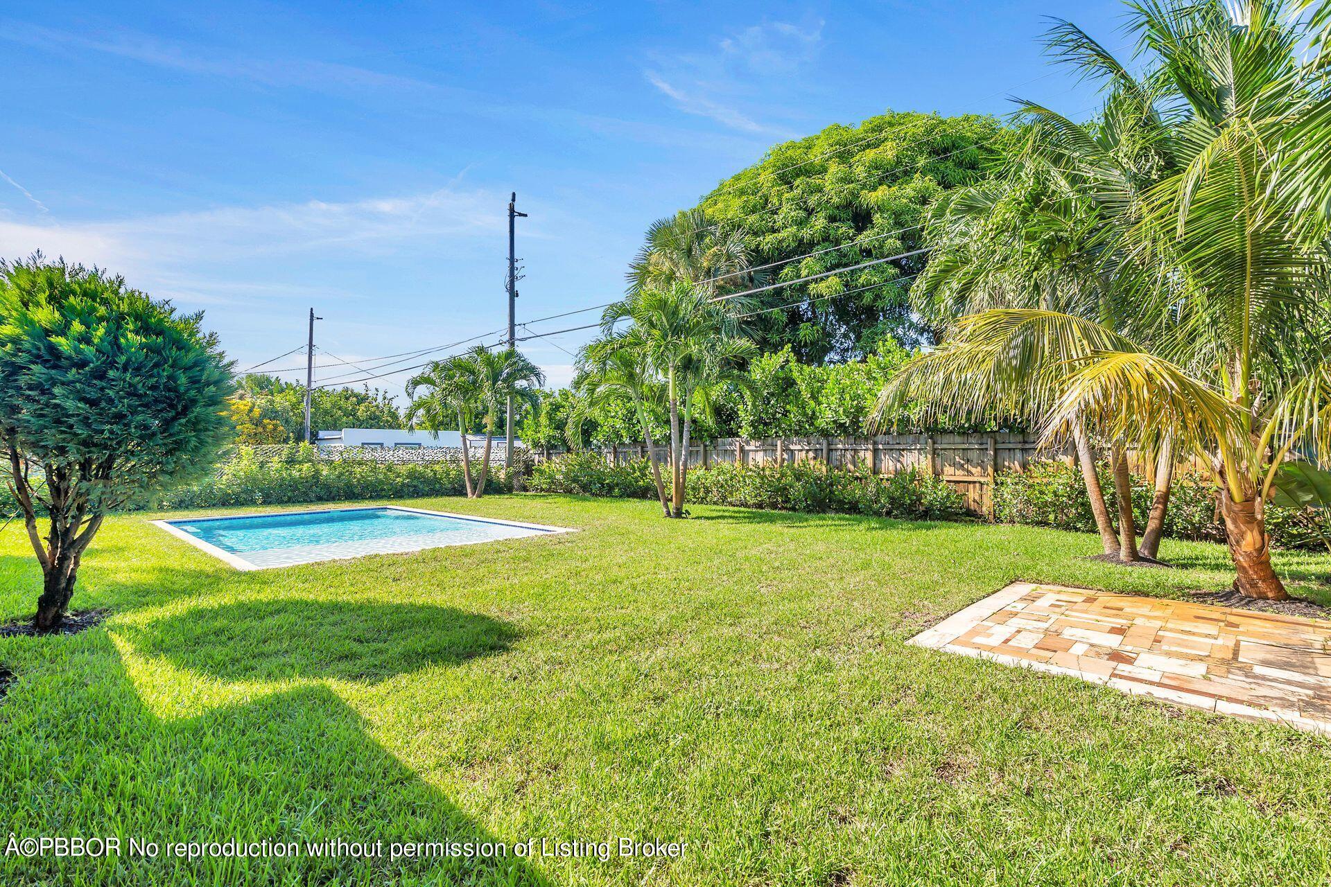 361 Franklin Road West Palm Beach, FL 33405 - Photo 25 of 32 a view of a backyard with large trees