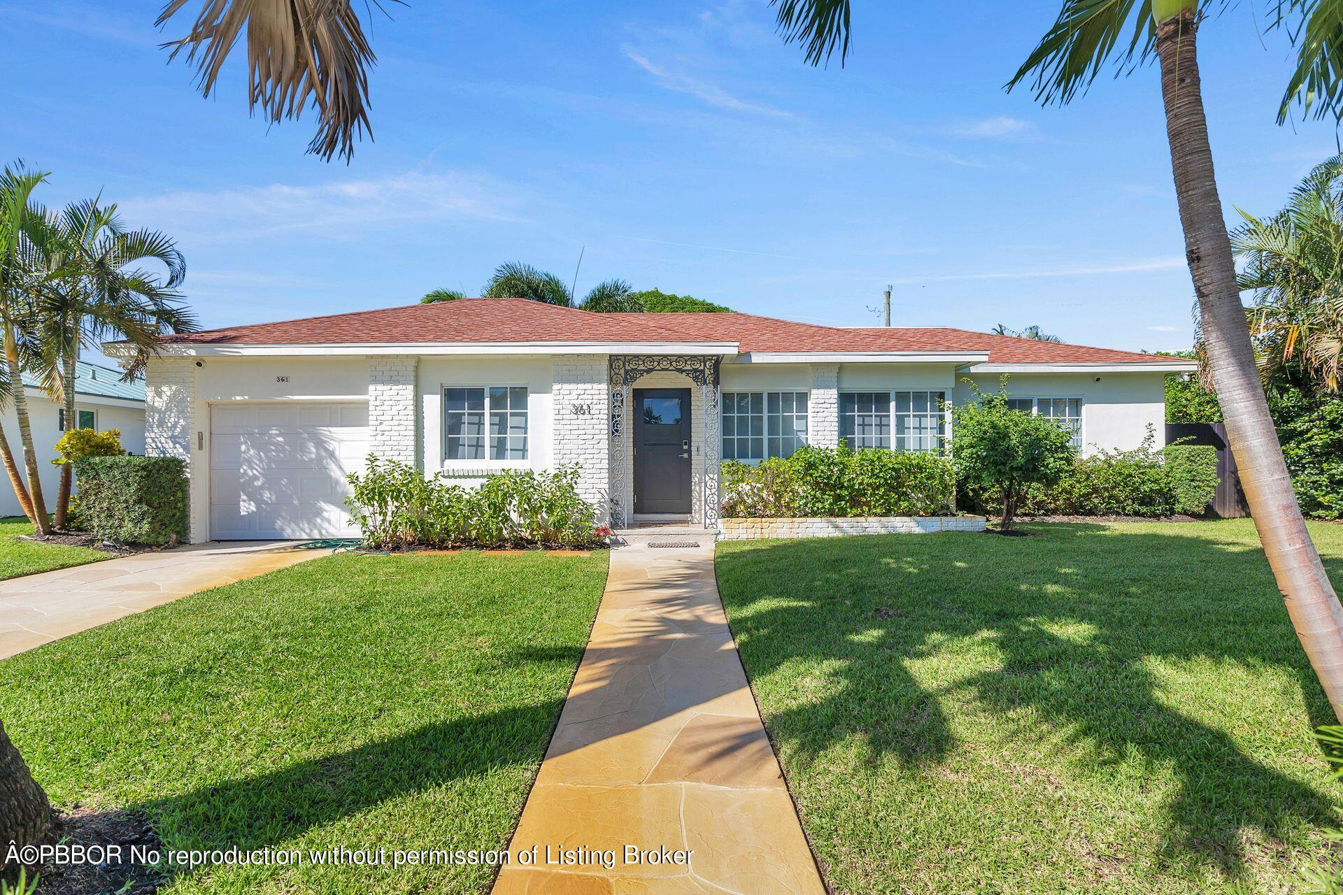 361 Franklin Road West Palm Beach, FL 33405 - Photo 27 of 32 a front view of a house with a yard