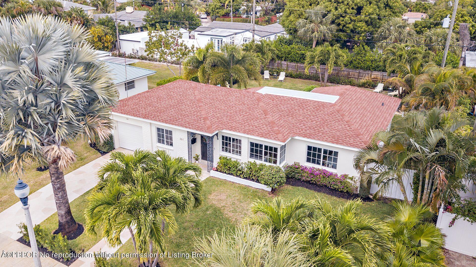 361 Franklin Road West Palm Beach, FL 33405 - Photo 31 of 32 a view of residential houses with yard and swimming pool