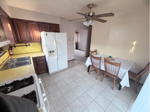 26 Adelphia Road Cape May, NJ 08204 - Photo 6 of 6 a kitchen with a refrigerator and a sink