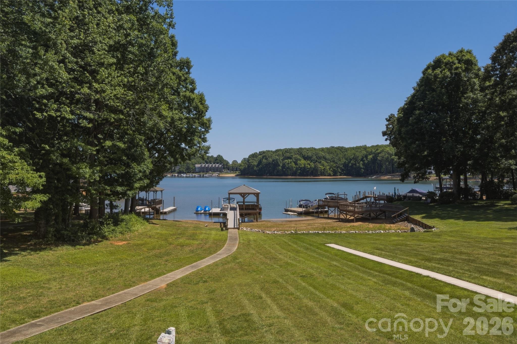 8226 Normandy Road Denver, NC 28037 - Photo 6 of 29 a view of a lake with houses with outdoor space