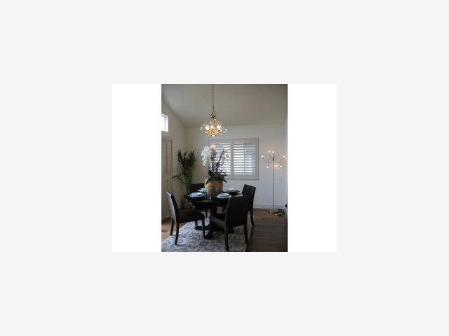 552 Monterey Road Pacifica, CA 94044 - Photo 5 of 9 a living room with furniture and a dining table