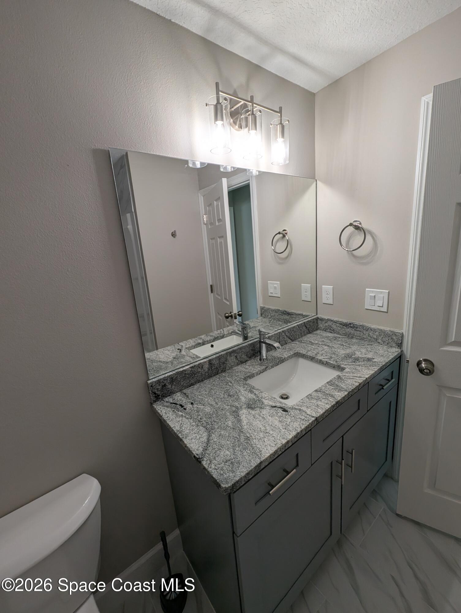 1356 Torgerson Road Southeast Palm Bay, FL 32909 - Photo 9 of 46 Hall Bath Vanity