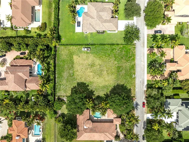 an aerial view of a residential houses