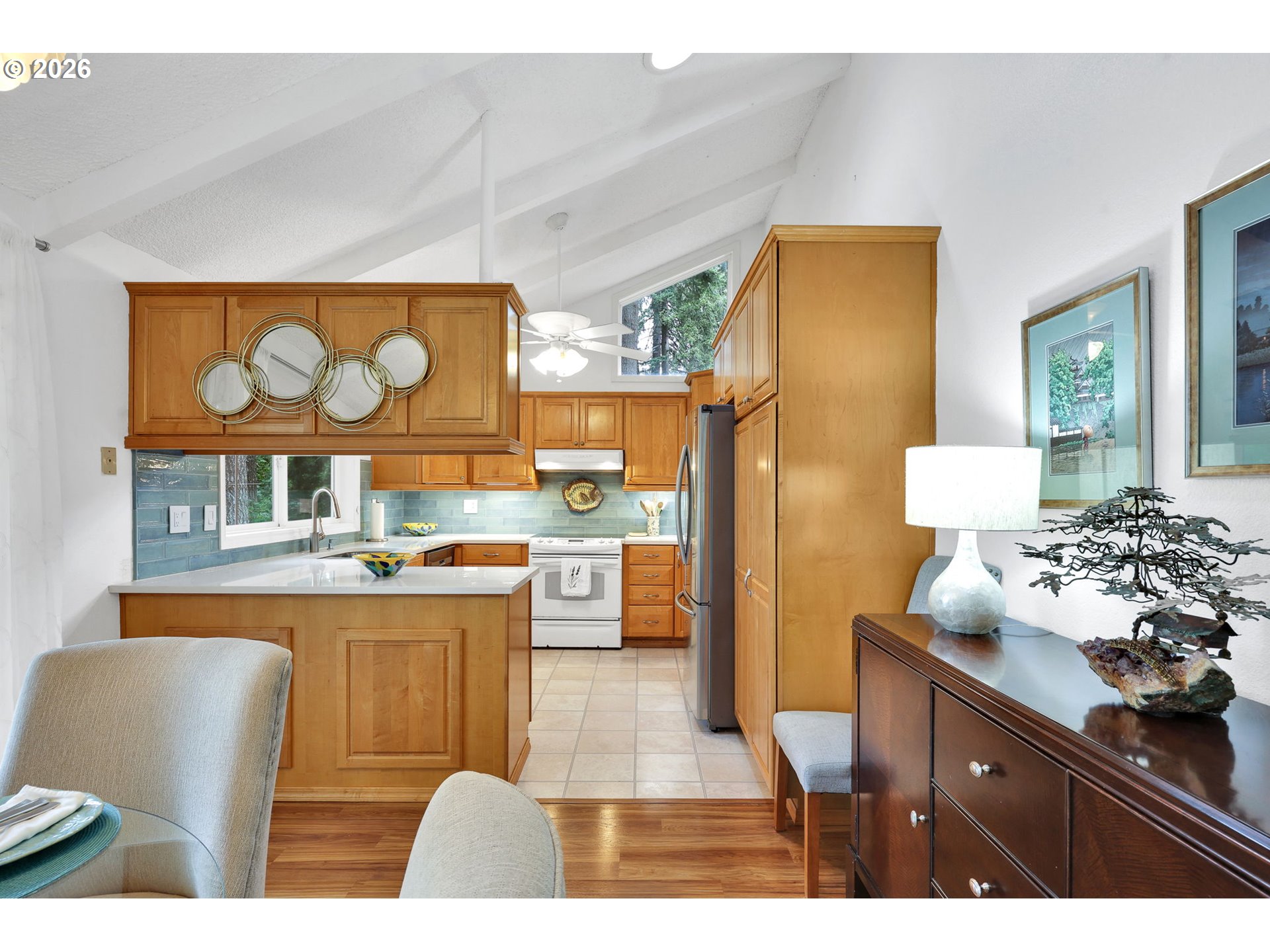88108 Tiki Lane Springfield, OR 97478 - Photo 15 of 48 a kitchen with a refrigerator and a stove