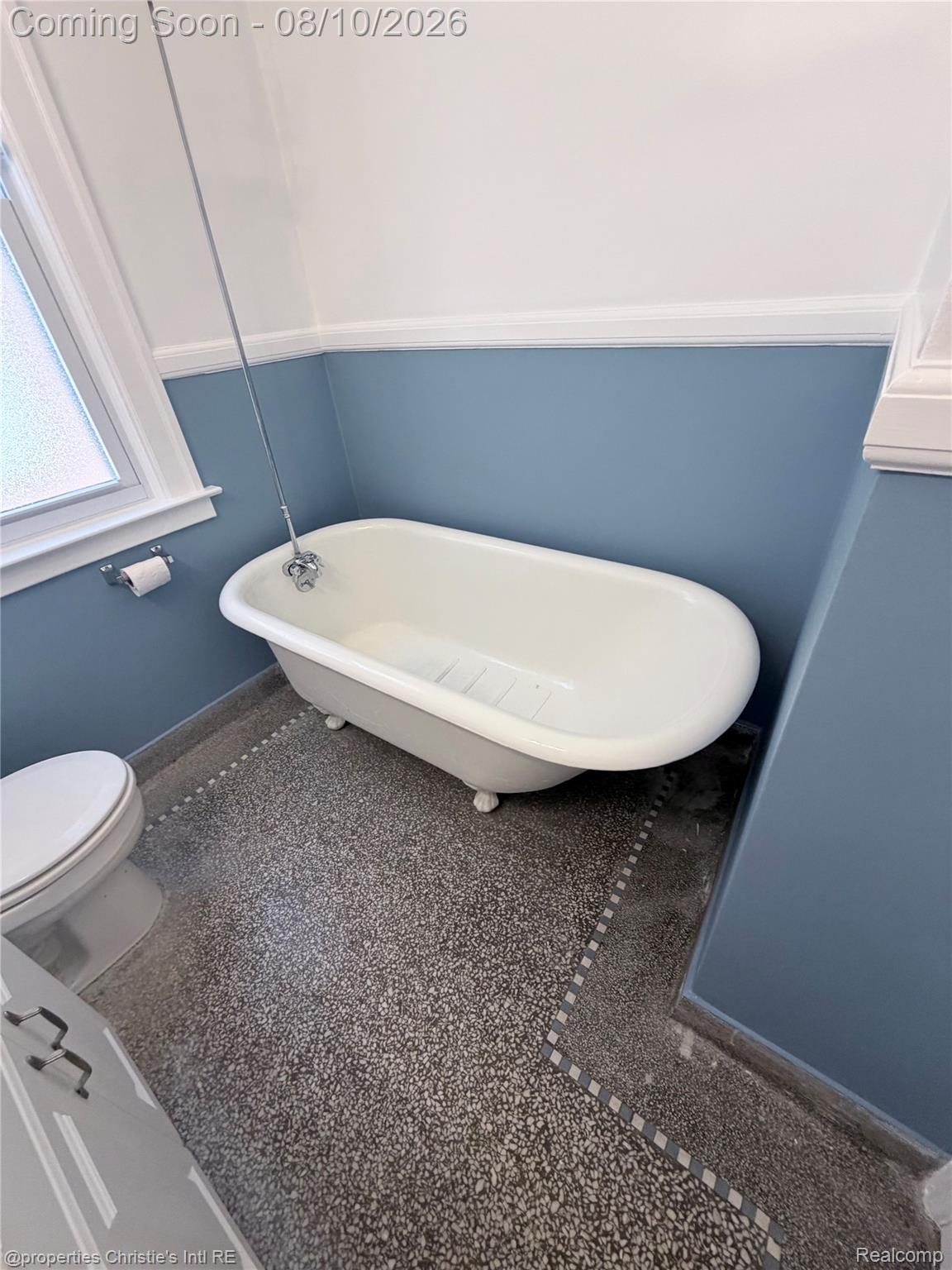 858 Nottingham Road Grosse Pointe, MI 48230 - Photo 11 of 16 Classic clawfoot soaking tub with polished chrome fixtures and deck-mounted faucet