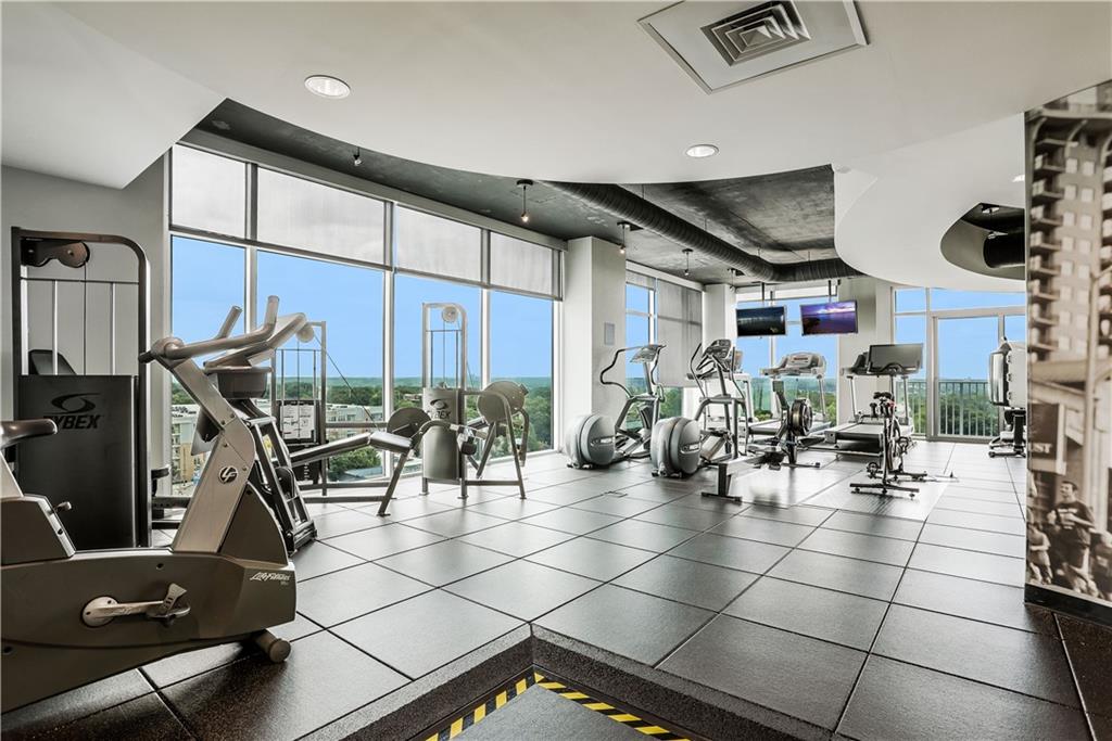 250 Pharr Road Northeast, Unit 2005 Atlanta, GA 30305 - Photo 28 of 49 a view of a room with gym equipment