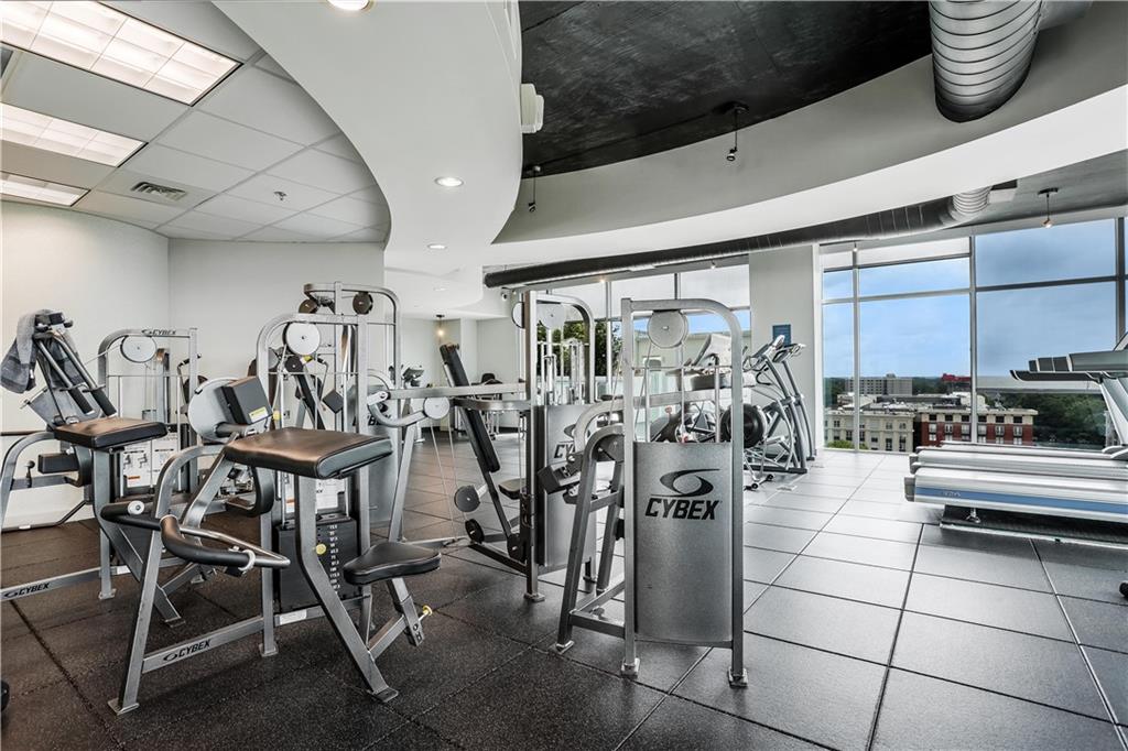 250 Pharr Road Northeast, Unit 2005 Atlanta, GA 30305 - Photo 29 of 49 a view of a room with gym equipment
