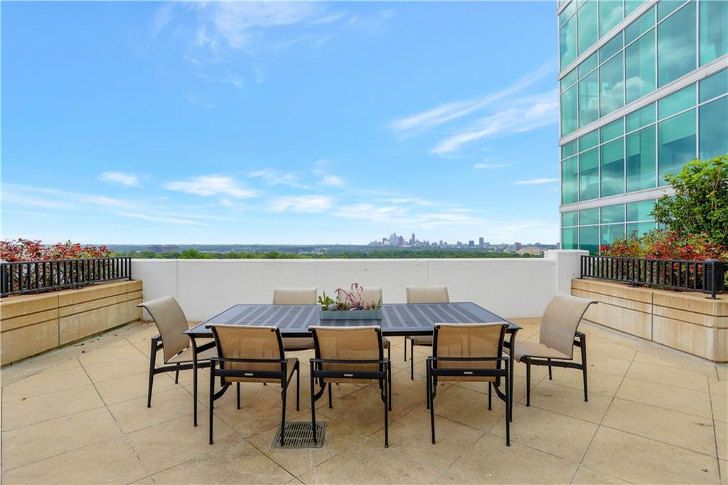250 Pharr Road Northeast, Unit 2005 Atlanta, GA 30305 - Photo 34 of 49 a view of chairs and table in a patio
