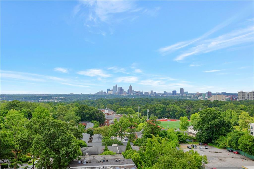 250 Pharr Road Northeast, Unit 2005 Atlanta, GA 30305 - Photo 35 of 49 a view of a city with lush green forest